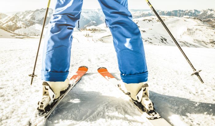 Professional Skier on Top of Slope in French Alps