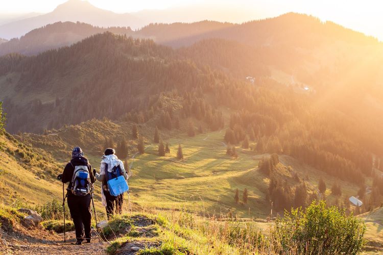 Couple Hiking; Overlooking Mountain